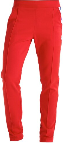 le coq sportif pantalon rouge