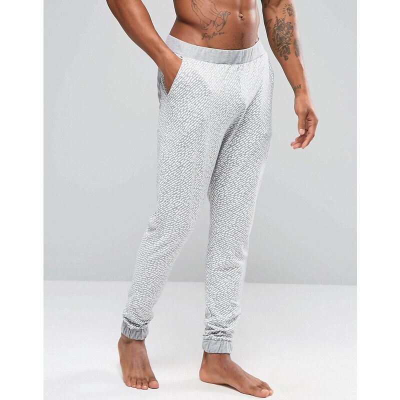ASOS Loungewear - Pantalon de jogging skinny en tissu léger à imprimé coups de pinceau - Gris