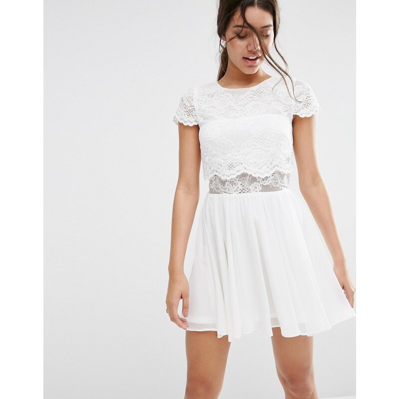 ASOS - Mini robe en dentelle avec top court - Blanc