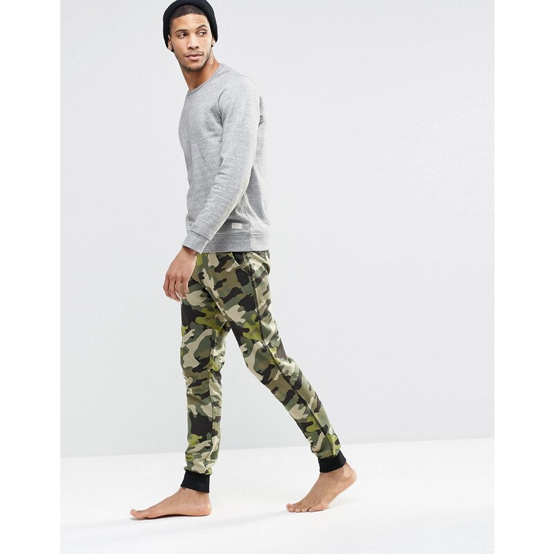 ASOS Loungewear - Pantalon de jogging skinny à motif camouflage - Vert