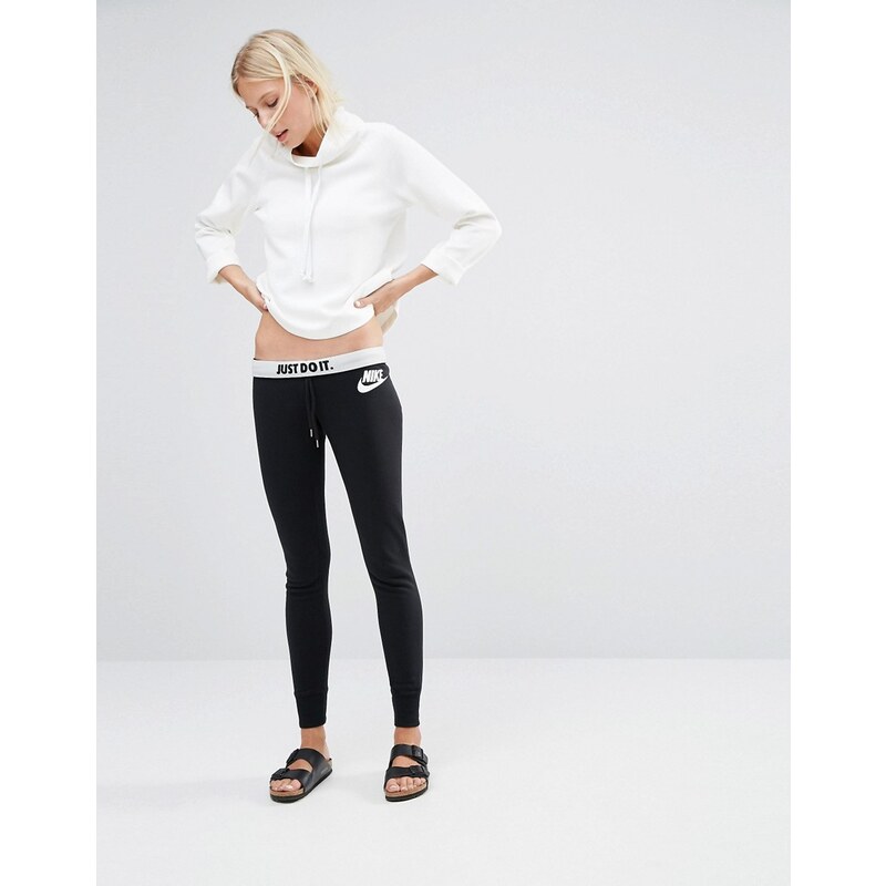 Nike - Pantalon de survêtement skinny avec logo à la taille - Noir