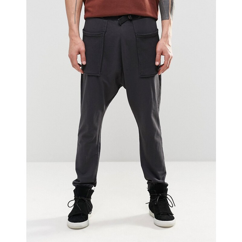 ASOS - Pantalon à entrejambe bas avec poches gaufrées - Noir délavé - Noir