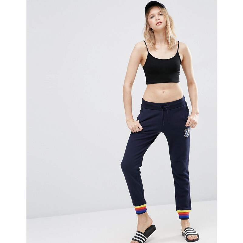 Adidas - Pantalon de survêtement resserré aux chevilles avec bordures contrastantes - Bleu marine