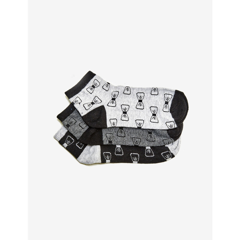 chaussettes imprimé noeud noires et grises Jennyfer