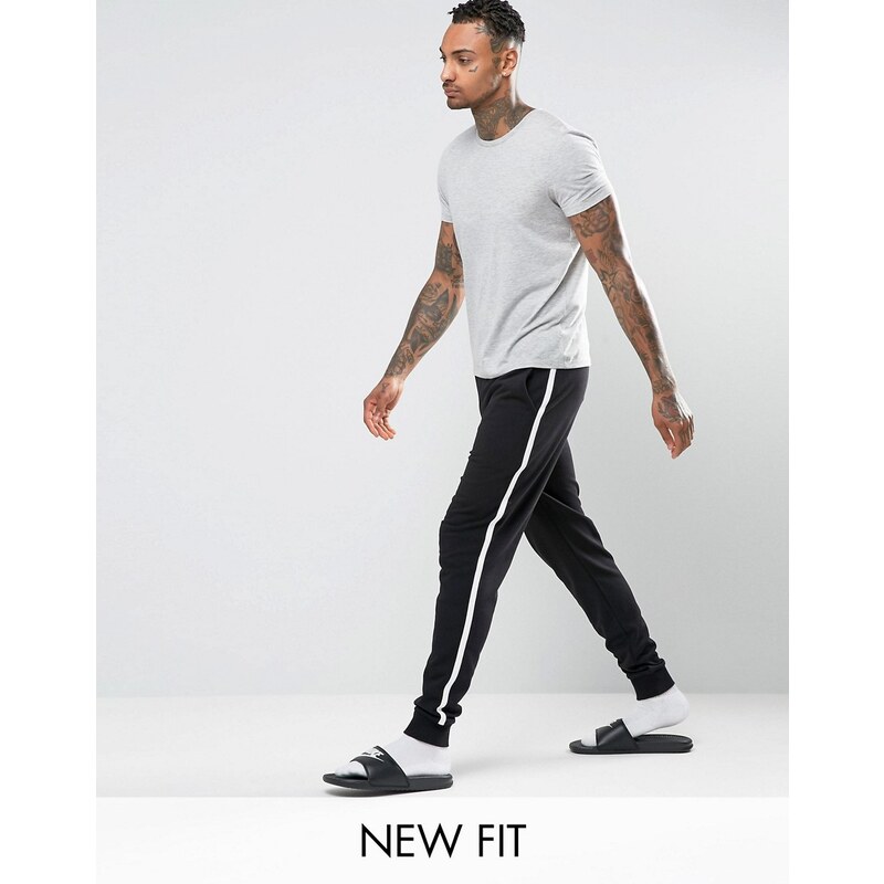 ASOS - Pantalon de jogging slim rayé sur le côté - Noir et blanc - Noir