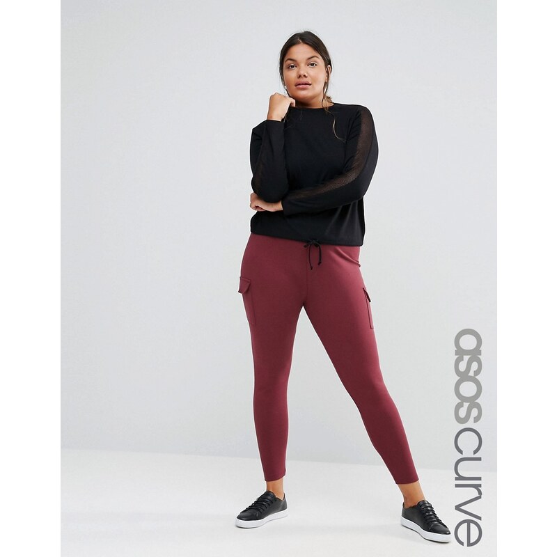 ASOS Curve - Pantalon skinny stretch avec poches - Rouge