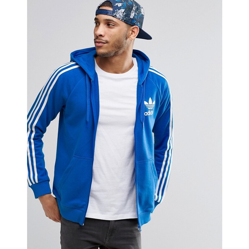 adidas Originals - AY7787 - Sweat à capuche zippé motif trèfle - Bleu