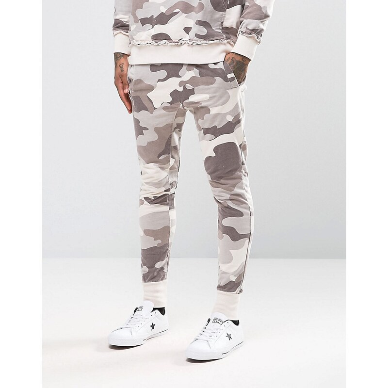 Other UK - Pantalon de jogging skinny à entrejambe bas motif camouflage - Rose