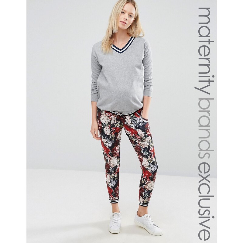 Bluebelle Maternity - Pantalon de jogging resseré aux chevilles à imprimé floral et bordure style universitaire - Multi