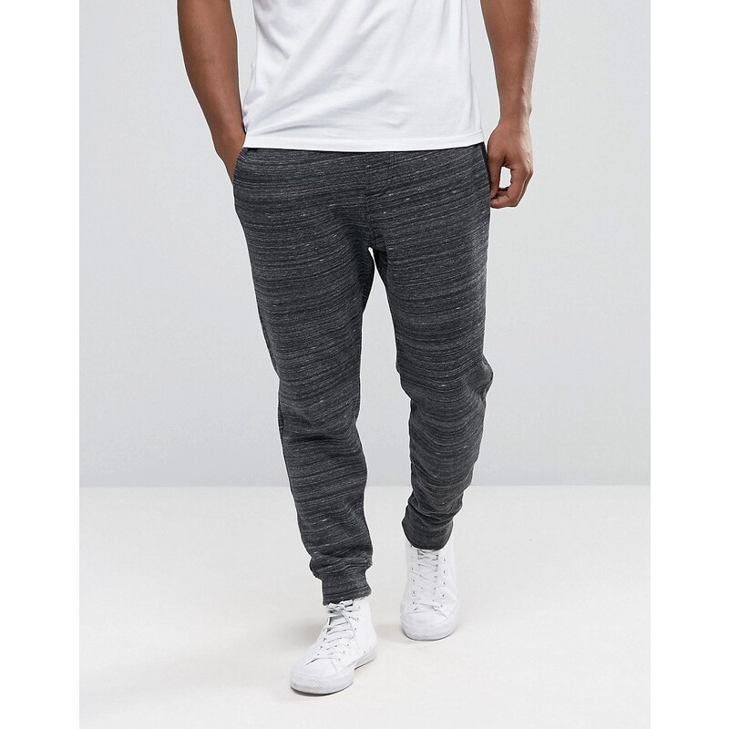 Hollister - Pantalon de survêtement resserré aux chevilles avec effet chiné multicolore et texturé - Noir - Noir