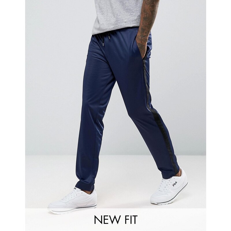 ASOS - Pantalon de jogging ajusté avec rayure de chaque côté - Bleu