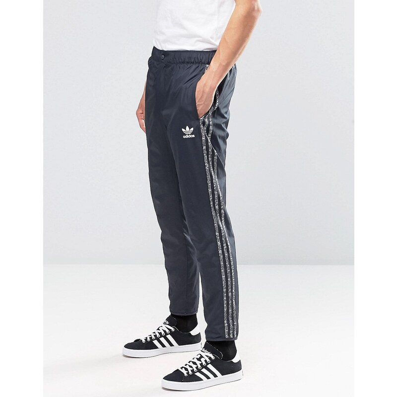 Adidas Originals - AY8363 - Pantalon de jogging avec logos variés - Gris - Gris