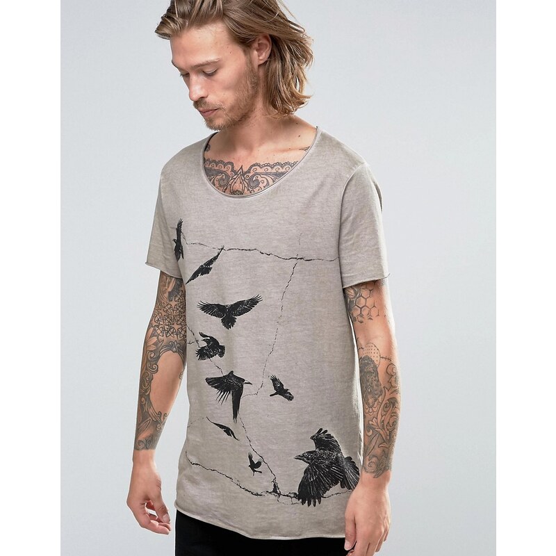 ASOS - T-shirt à encolure dégagée et ourlet brut avec imprimé oiseaux et teinture pigmentée - Beige
