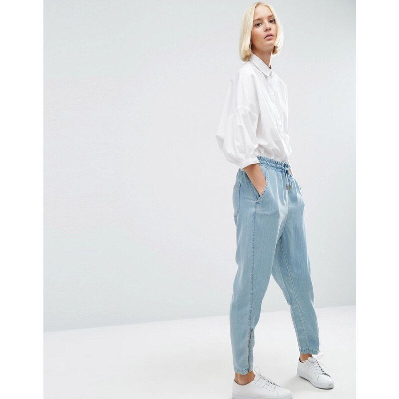ASOS WHITE - Pantalon de jogging en lyocell aspect jean avec fermetures zippées - Bleu